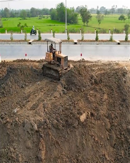 1.5K views · 26 reactions | Great Progress!!! Filling Roadside Land With Dump Truck Unloading Soil & Komatsu D31E Bulldozer Pushing Soil | Bulldozer Operator | Facebook