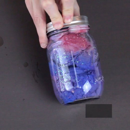 Learn about space when you make a nebula in a jar! This fun STEAM activity is perfect for little space lovers. Find 29 other easy science experiments in a jar in The Mason Jar Scientist, now avilable on Amazon! https://amzn.to/2OJROSq | Jarring Science for Kids