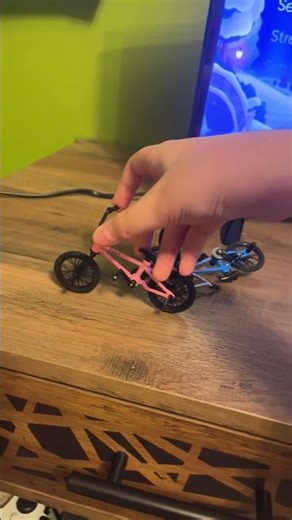 Fiddling with finger bmx bikes