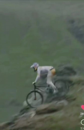 Mountain Biker's Thrilling Ride on Rocky Terrain