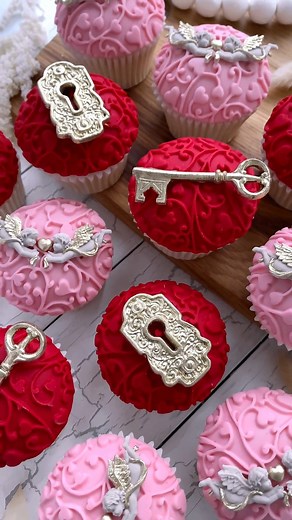 4K views · 44 reactions | Beautiful Valentine’s cupcakes by Bibbidi Bake Co 殺 Made using our Heart Vine, Locks & Key and Mini Cherub super-easy-to-use moulds find more Valentine's inspo https://katysuedesigns.com/blogs/cake-decorating-blog/baking-ideas-for-a-sweet-valentines-day | Katy Sue Cake Decorating | Facebook
