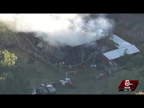 Lancaster barn fire sends thick smoke into the sky, roof collapses