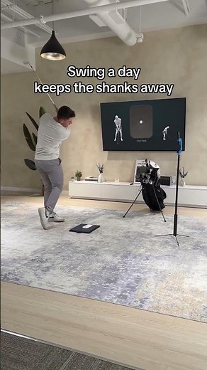 Practice Golf at Home with the Golf Daddy Simulator ($99)