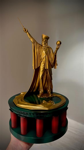 Sarah ✨ Magically Home on Instagram: "Ministry of Magic Statue ✨ There’s a new collectible statue available at the Ministry of Magic in Epic Universe 💗 Reminiscent of the retired Hogwarts Architect but much lighter. Material feels like composite plastic & resin. 🛒 Epic Universe Tour en Floo Shop @universalorlando $115 🏷️ #magicallyhome #epicuniverse #ministryofmagic"