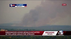 Greenwood homes being evacuated, ahead of spreading grass fire