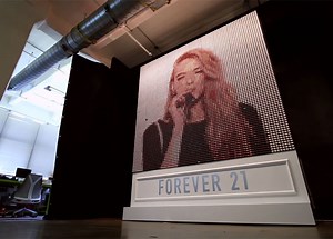 This Giant Screen Displays Photos with 6,400 Spools of Colored Thread