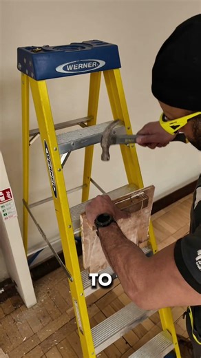 Wood Electrical Installs a Catenary Wire Between Two BuildingsSteel
