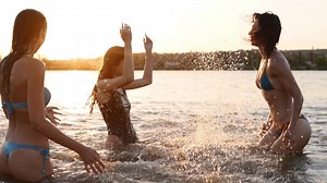 Happy Wet Girls Bikini Run Into Stock Footage Video (100% Royalty-free) 1054682027 | Shutterstock