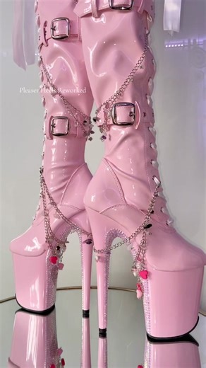 Custom thigh high Pleasers adorned with an inner-platform rhinestone hearts design, 8 custom PHR Hand-crafted Shoe Charms, and white ribbon laces 💖⛓️✨ #customshoes #pleaserheels #pink #thighhighboots #pinkboots #8inchheels #rhinestones #shoecharms #poleheels