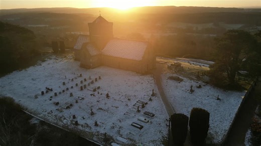 Frost covers churchyard as UK gripped by freezing temperatures