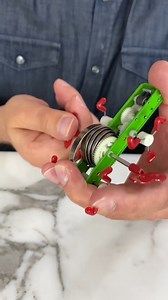 30K views · 115 reactions | WINDUP TOY SHOOTS SPARKS AND WALKS OVER PHONES This video was produced by Network Media and Rick Lax and Network Media Remix | The Puzzle and Pointers | Facebook