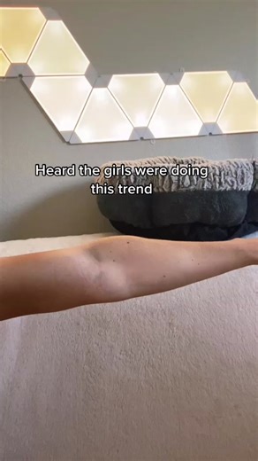 Biceps Flexing Fun: Join the Trend with Kathryn Mueller