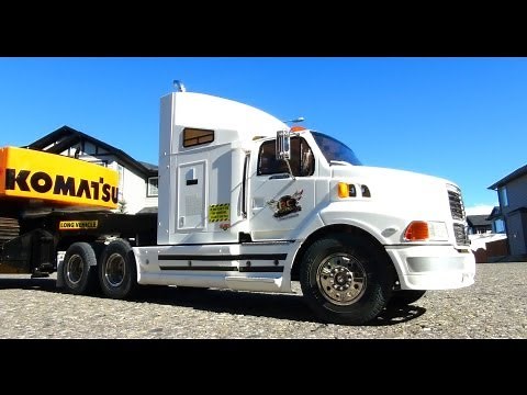 RC ADVENTURES - Ford AeroMax 1/14th 6X4 Semi Truck hauling Excavator on Trailer