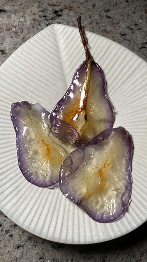 Glass poached pear - part 1 the most beautiful and delicious garnish to any dessert and in this instance stay tuned to see what I add this to. Crystallized fruit is usually very straight forward but of course I wanted to make these pears extra special for Bae. Poached in the most delicious spiced pea flower tea, then thinly sliced and dehydrated. The last step is candying the slices by taking the sugar to the right temperature and working quickly before it dries and gets too sticky. The spiced p