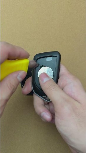 Replace Chevrolet Key Battery CR2045 keyless entry Remote YG0G20TB1 instruction