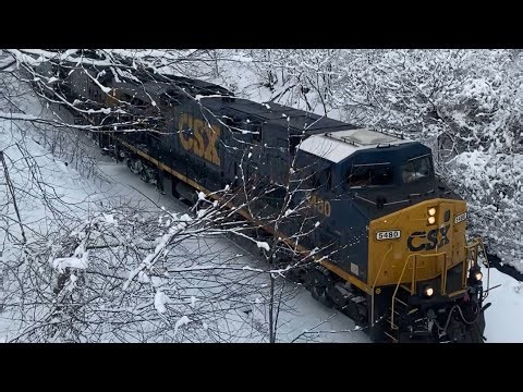 CSX I022/19 passes by CP56 with locomotives #5480 and #101