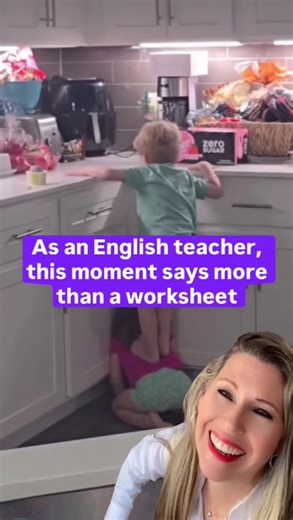 EWA: Learn English on Instagram: "As an English teacher, this moment says more than any worksheet. @tricia.l.horton @ewa.english “Use me as a stool.” This is what real-life problem solving looks like. No instructions. No adult stepping in. Just two kids looking at the same problem and thinking, “How do we solve this together?” One drops down on all fours. The other climbs up. A split second of trust. “Got it!” 🍪 Teamwork isn’t taught through lectures. It’s learned in moments like this — where c
