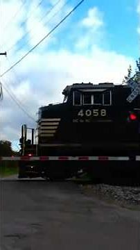 Three Norfolk Southern Super SD40-2 engines Help pull freight train
