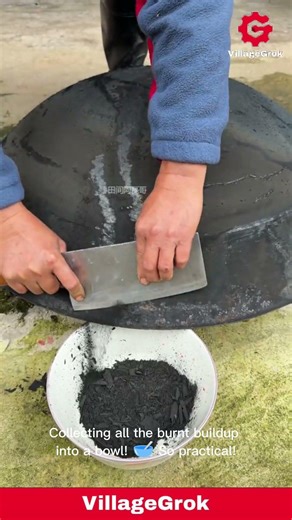 Effective Wok Cleaning: Removing Charcoal with a Cleaver