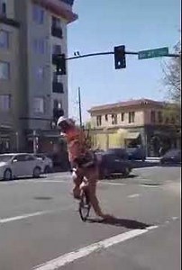 flaming trex playing flaming bagpipes on a unicycle