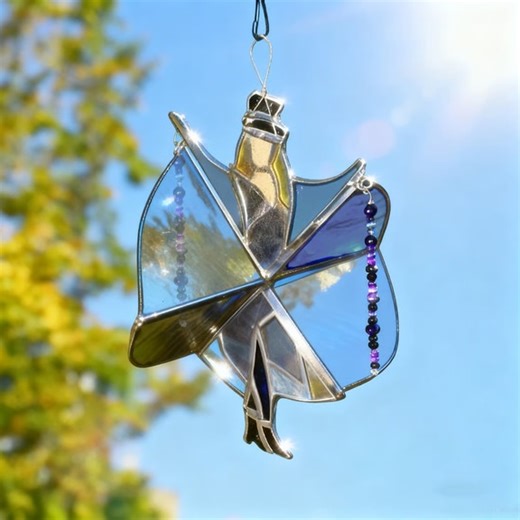 "Loving my new Stevie Nicks stained glass spinning suncatcher🥰 Just like her song Dreams, it moves with the wind 🌬️ — light, free, and a little bit mysterious 🌙. Perfect for fans of Fleetwood Mac 🎸 and lovers of beautiful garden decor 🌿🏡✨" https://hatonic.com/products/handmade-stained-glass-spinner | Bianka Finance