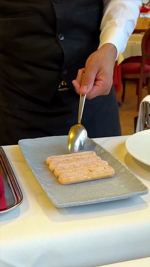 Indulging in the extravagant pleasure of table side Tiramisu in Venice, while pondering the ethical implications of consuming such a delicacy in a city that's sinking due to climate change. #tiramisu #venice #italyfood