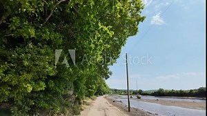Kingsbridge south Devon, England, UK. 31st May 2024. The tidal road alongside the River Avon in south Devon UK Stock Video