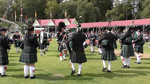 Kintore Pipe Band led by Drum Major Ronnie Rennie entertaining crowds in the arena during the 2018 Braemar Gathering Highland Games in the Cairngorms, Scotland. Visit Braemar . VisitCairngorms . VisitAberdeenshire . Braemar Gathering and Highland Games Centre | Scotland Online