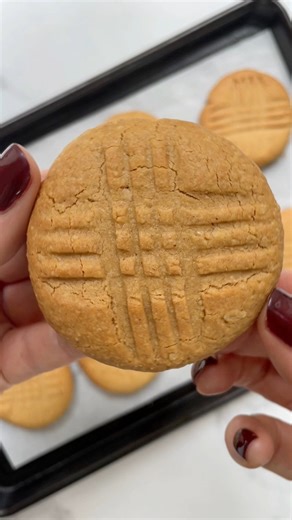 These cookies couldn’t be simpler to make. Literally mix some smooth peanut butter with a little maple syrup and oat flour, and bake for 12 minutes. They make the best power snack! | Helen Ridgeway Nutrition