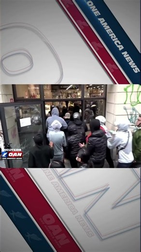 LOOTERS SMASH SHOPS AS RIOTS ERUPT IN MILAN