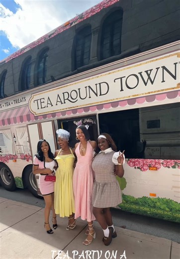 Experience a Delightful Tea Party on a Pink Double-Decker Bus