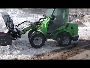 Avant 760i snowblower real world action moving old plow piles