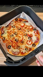 Easy Tortilla Pizza in the Air Fryer | So Delicious and Ready in Minutes!🥰 ✨ Ingredients: 2 tortillas 2 tbsp pizza tomato sauce 100 g (1 cup) grated mozzarella cheese Sausage (pepperoni works best) Cherry tomatoes Olives 🔥 Instructions: Place one tortilla on a flat surface. Spread pizza tomato sauce and sprinkle with grated mozzarella. Add sausage, cherry tomatoes, and olives. Cover with another tortilla and spread more sauce. Top with cheese and bake in the air fryer for 7 minutes at 180°C / 