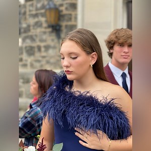 Dark blue homecoming dress. A beautiful modest dress with bouncy feathers.