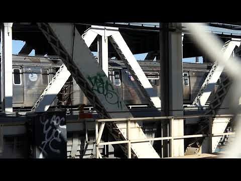 NYC Subway trains crossing on the Manhattan Bridge: (R46, R68/A & R160)