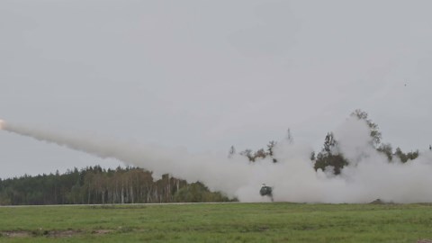 US Army Firing Artillery Defense Forces in Training