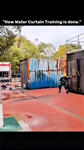 KNOWLEDGE ILLUSION on Instagram: "THIS IS HOW A WATER CURTAIN CAN STOP FIRE 🔥💧 A water curtain is a fire-control system where a continuous sheet of water is released through specially designed nozzles to form a dense barrier between fire and its surroundings. This flowing wall of water absorbs heat through evaporation, rapidly lowering the temperature of the flames while also blocking radiant heat that could ignite nearby objects. At the same time, the curtain dilutes smoke and hot gases, redu
