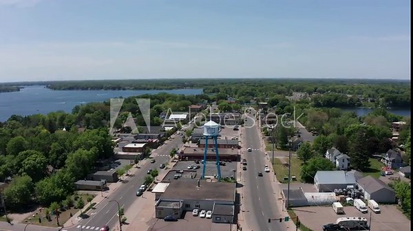 Descending and panning aerial shot of downtown Lindstrom, Minnesota. 4K