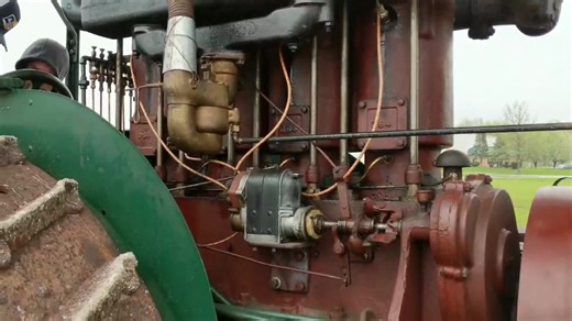 It's drizzling rain at the Aumann Vintage Power Pre-30 Open House, but that's not stopping anyone from having a great time and running tractors like this awesome rare Sawyer Massey Model 27-50. See all the Pre-30 Catalogs at https://bit.ly/39xjiHR #classictractorfever #aumannauctions #aumannvintagepower | Classic Tractor Fever