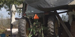 Man arrested for DUI after tractor crashes into Hendrix home