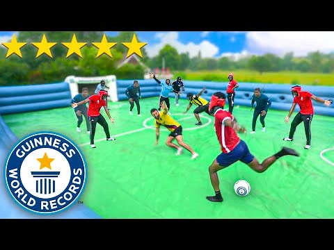 WORLD'S BIGGEST SLIP 'N' SLIDE FOOTBALL MATCH!! ⚽️💦