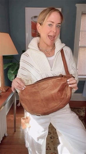Tara West on Instagram: "As a fashion stylist, I’m always on the lookout for the perfect crossbody bag for my clients and myself. I’m excited to introduce the Callie bag from Latico Leathers. The Callie bag is a masterful blend of style and functionality. Its sleek design is visually appealing, and it has ample space to hold all my styling essentials. Its versatility allows both left-handed and right-handed individuals to wear it comfortably, making it truly ideal. I believe everyone needs a bag