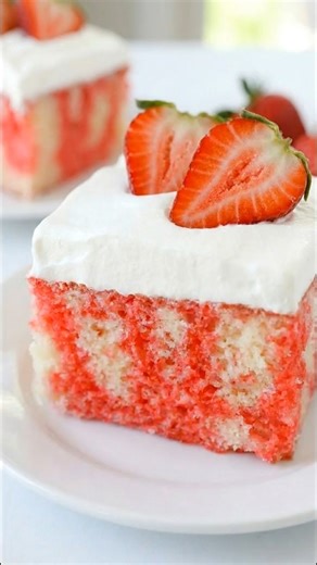 Strawberry Jello Poke Cake – Cool, Creamy & Bursting with Sweet Berry Flavor 🍓 This classic Jello Poke Cake is one of those easy, nostalgic desserts that never goes out of style. Light, fluffy white cake soaked with vibrant strawberry Jell-O and topped with a cloud of whipped topping… every slice is moist, chilled, and full of fruity goodness. It’s the kind of dessert that disappears fast at family gatherings. Save this recipe and tag someone who loves an easy, make-ahead treat! Yield: 12 large