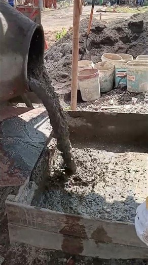 concrete mix from a concrete mixer.