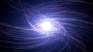 Pulsars are the most powerful magnets in the universe. A new simulation -- a “pulsar in a box” -- is giving scientists insights into the extreme physics of these spinning neutron stars. The simulation shows that most of the electrons (blue, with lighter shades representing higher energies) tend to race outward from the magnetic poles. But some medium-energy electrons scatter wildly, even heading back to the pulsar. The positrons (red) mostly flow out at lower latitudes, forming a relatively thin