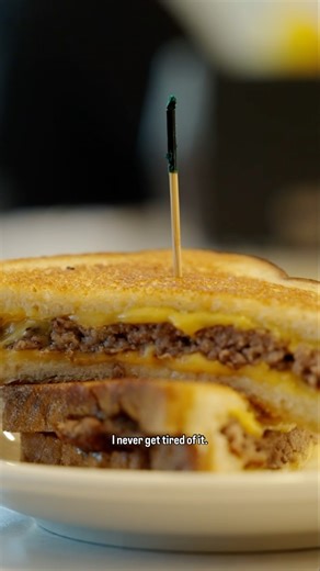 Picture a perfectly buttery grilled cheese but with a smash patty right in the middle—it’s the Chester. It’s not on the menu at @hamburger_america, but Chef George Motz says they’ll make it for you if you ask. | Bon Appétit Magazine