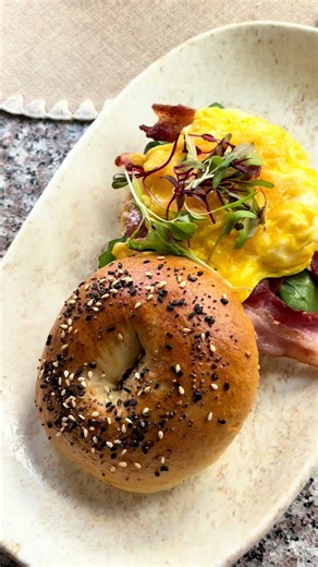 Day 23/30: Fresh Bagels. 🥯✨ Crisp on the outside, perfectly chewy on the inside, and completely worth the effort. Full measurements and essential baking tips are listed below. The Recipe •Bread Flour: 350g (approx. 2 3/4 cups, spooned & leveled) •Cake Flour: 150g (approx. 1 1/4 cups, spooned & leveled) •Warm Water: 300ml / 1 1/4 cups •Instant or Active Dry Yeast: 1 1/2 tsp (5g) •Sugar or Honey: 1 tbsp •Fine Salt: 1 1/2 tsp For the Water Bath: •Water: A large pot (2–3 liters) •Honey: 1 to 2 tbsp
