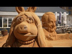 Charlie Chaplin and Miss Piggy are amongst the icons recreated at Sand Sculpture festival in Denmark
