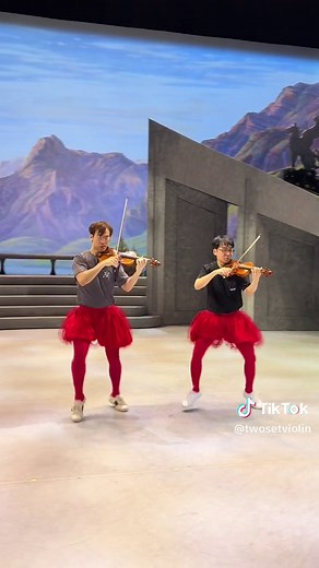 Ballet Dancer Harmonizing with Violin Orchestra
