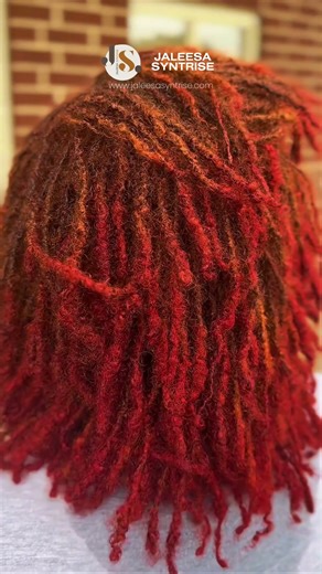 From deep black locs to a dimensional red-orange blend 🔥